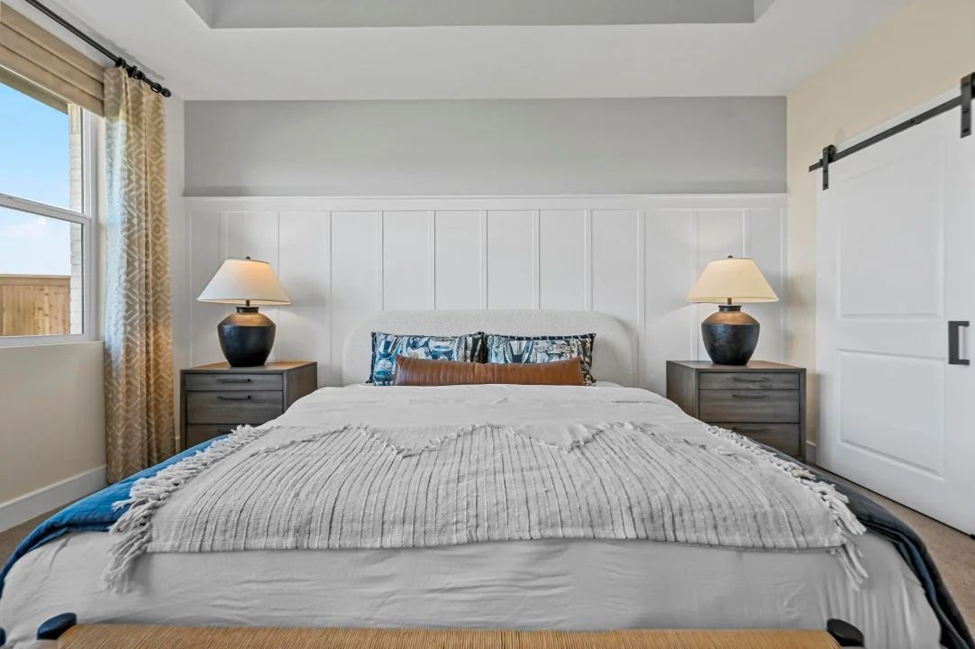 Primary suite with decorative feature wall