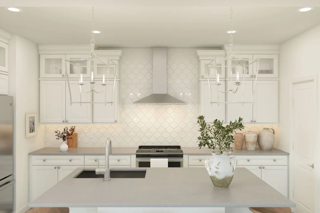Kitchen with pendant lighting and hexagonal backsplash
