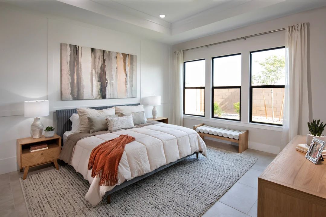 Primary suite with decorative feature wall