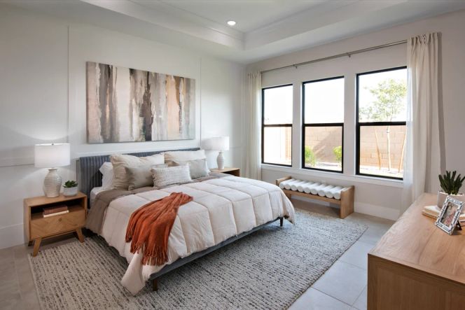 Primary suite with decorative feature wall
