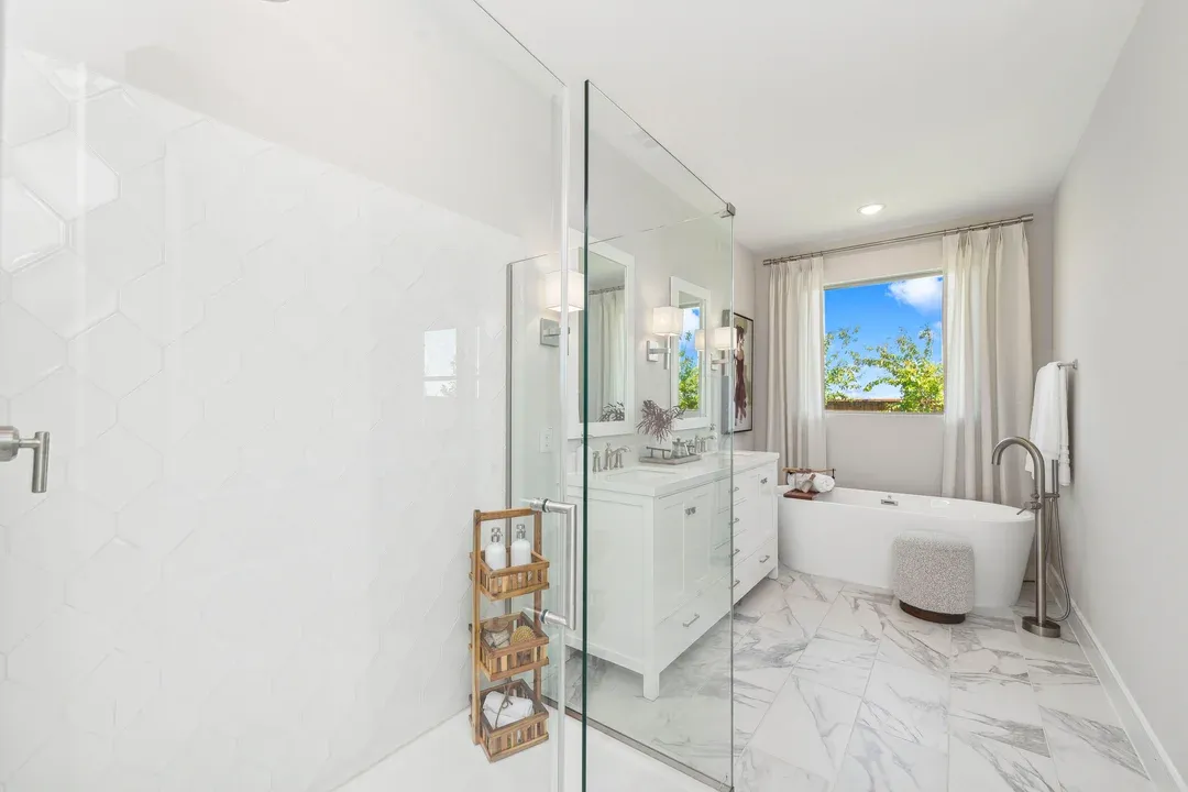 Primary bath with glass shower enclosure