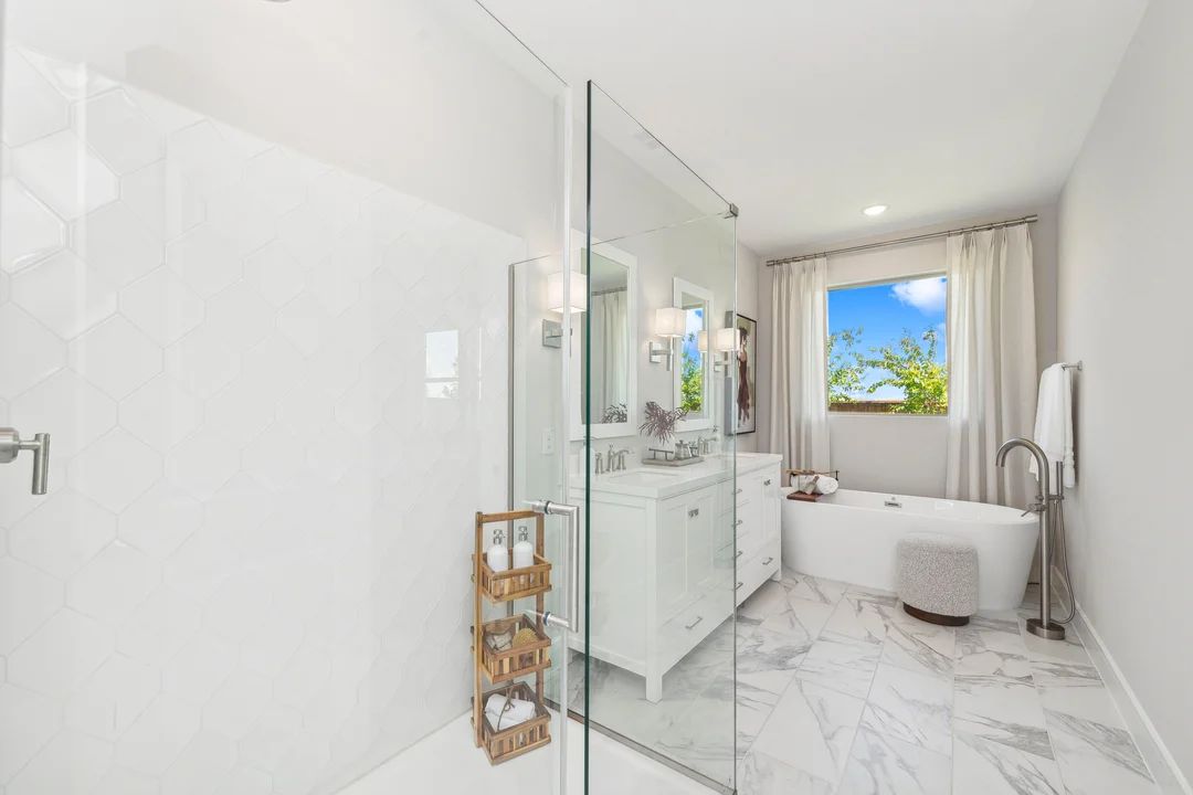 Primary bath with glass shower enclosure