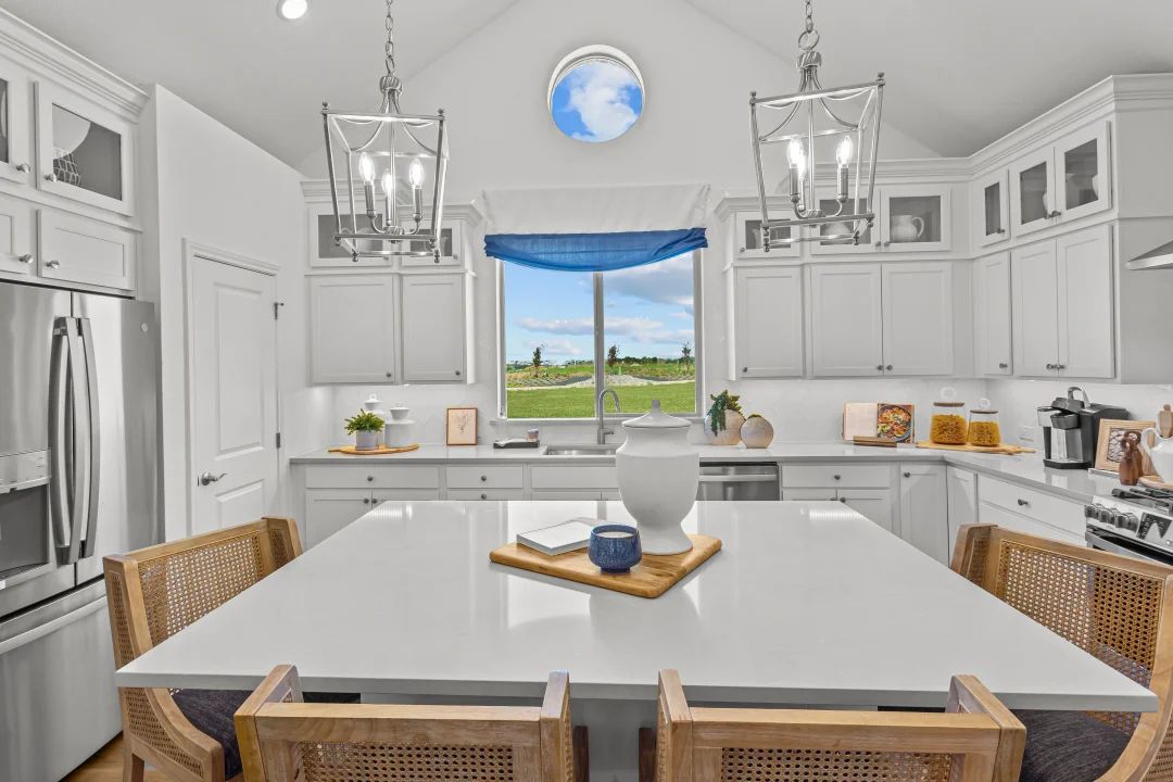 Kitchen with island and vaulted ceiling
