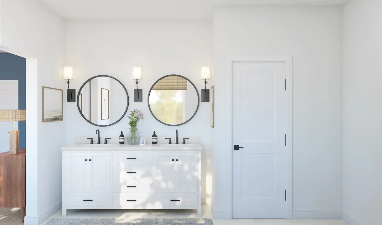 Primary bath features freestanding vanity with dual sinks
