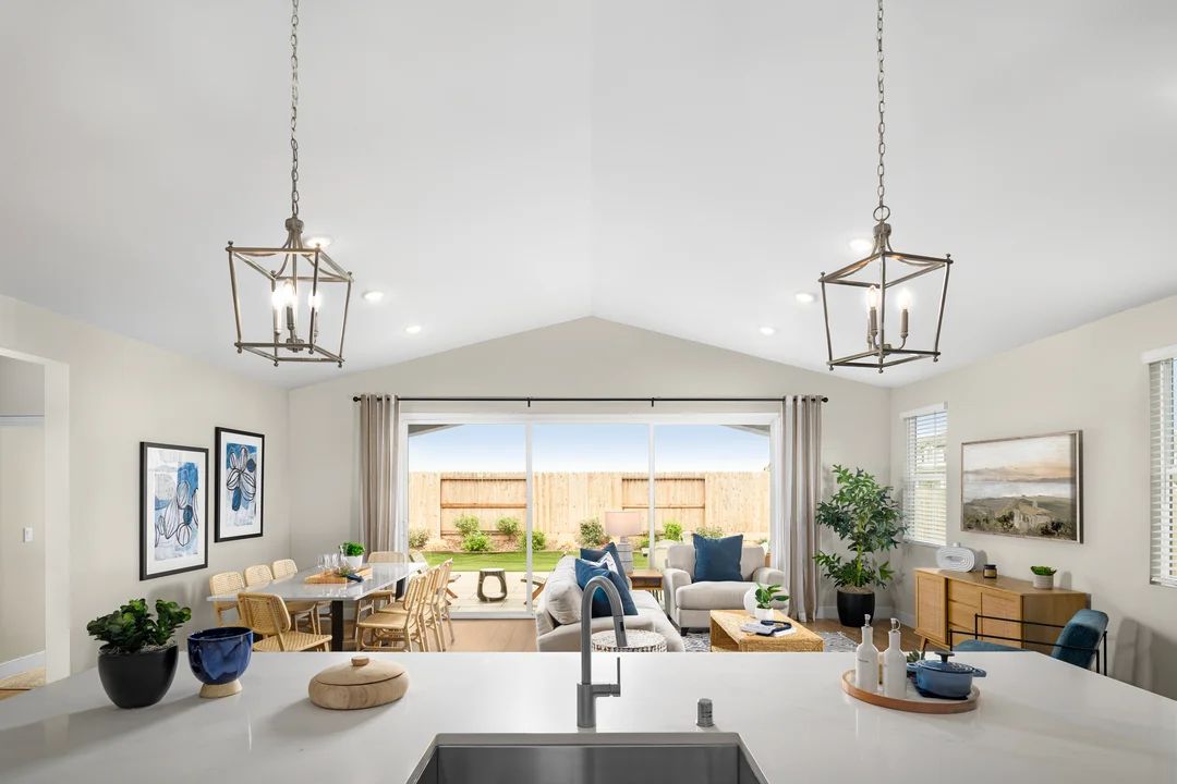 Kitchen with pendant lighting overlooking the great room