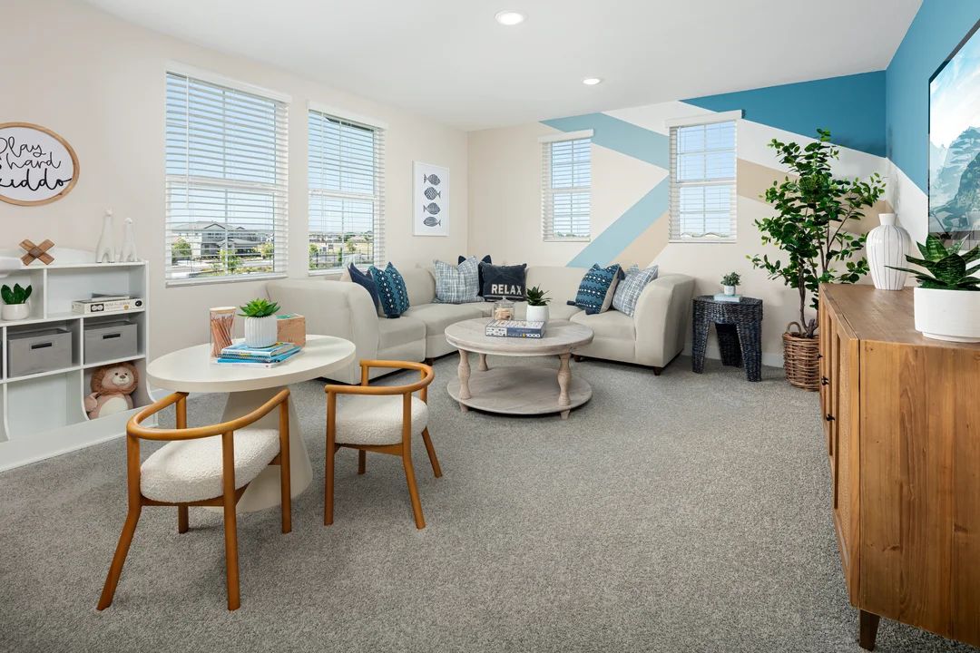 Versatile loft space with plush carpeting