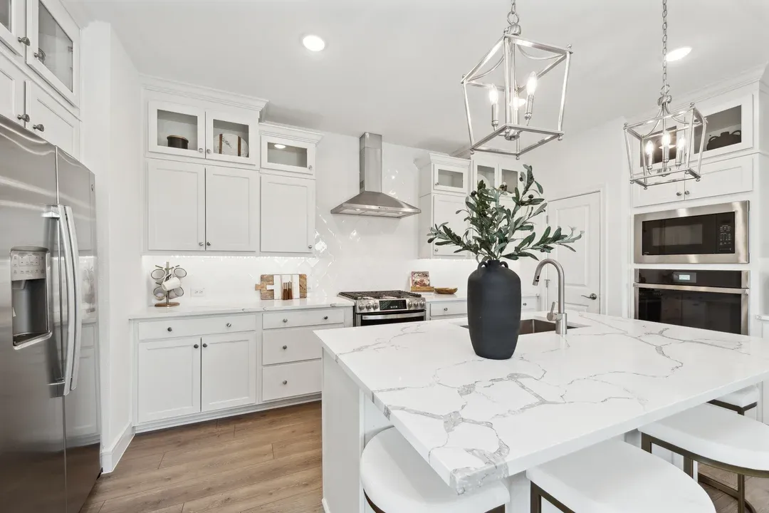 Full-height backsplash with glass upper cabinets