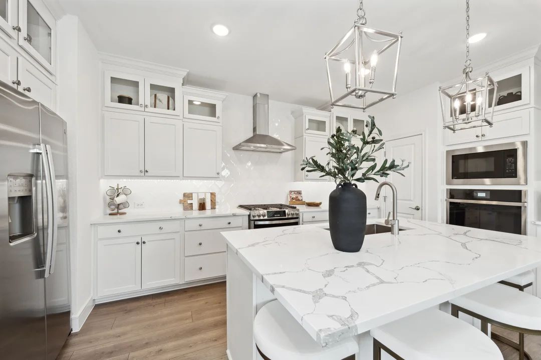 Full-height backsplash with glass upper cabinets