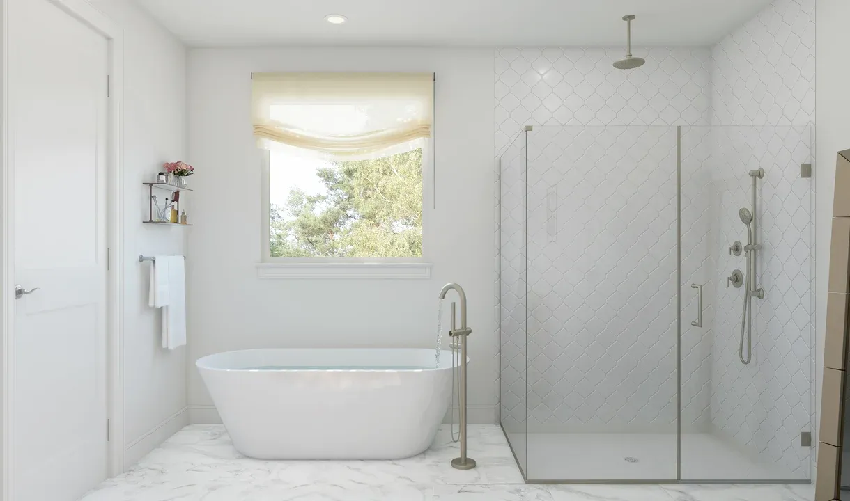 Primary bath with freestanding tub and glass shower enclosure