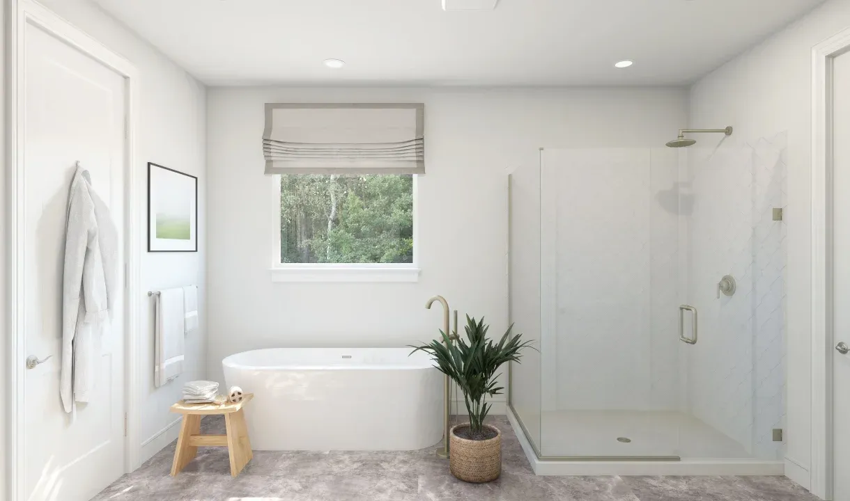 Primary bath with freestanding tub and glass shower enclosure