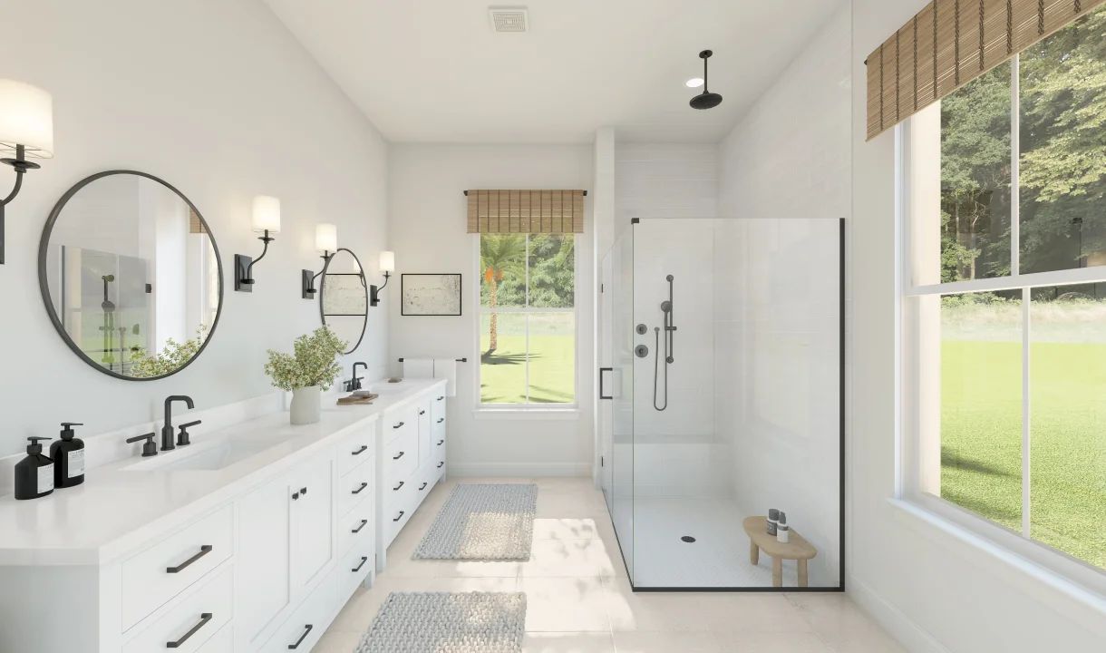 Primary bath with glass shower and dual vanities