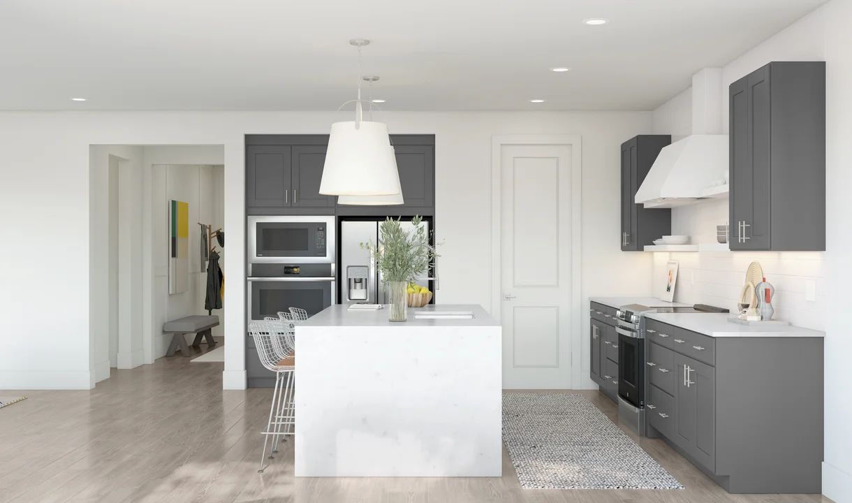 Kitchen with pendant lighting and waterfall island
