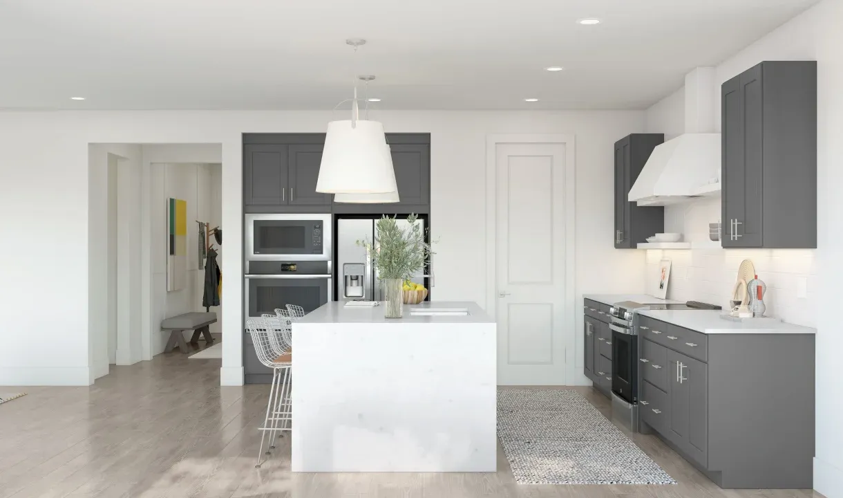 Kitchen with pendant lighting and waterfall island