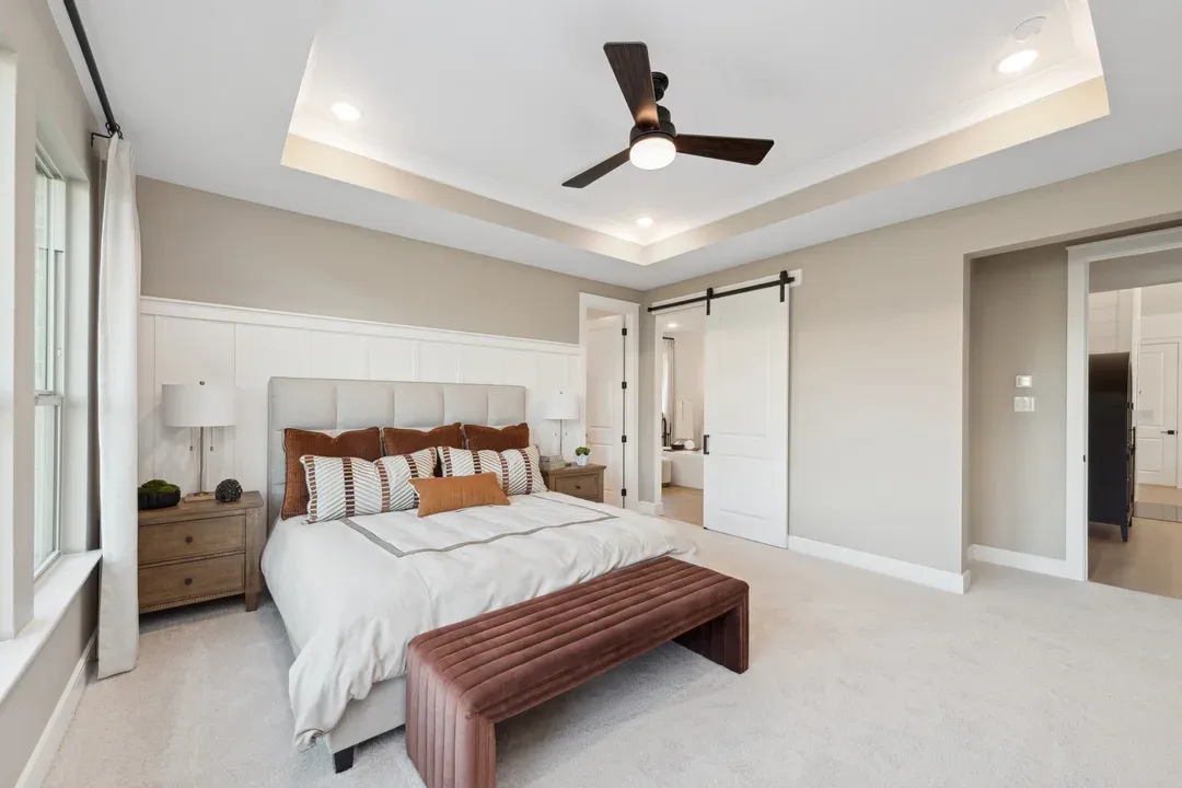 Primary suite with decorative feature wall