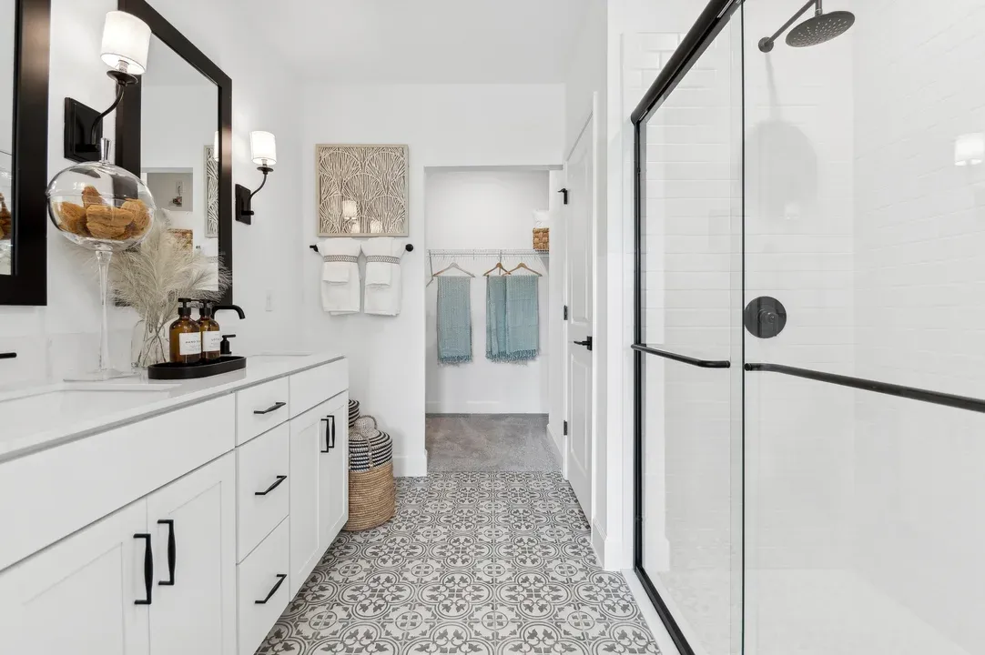Primary bath with shower and freestanding vanity