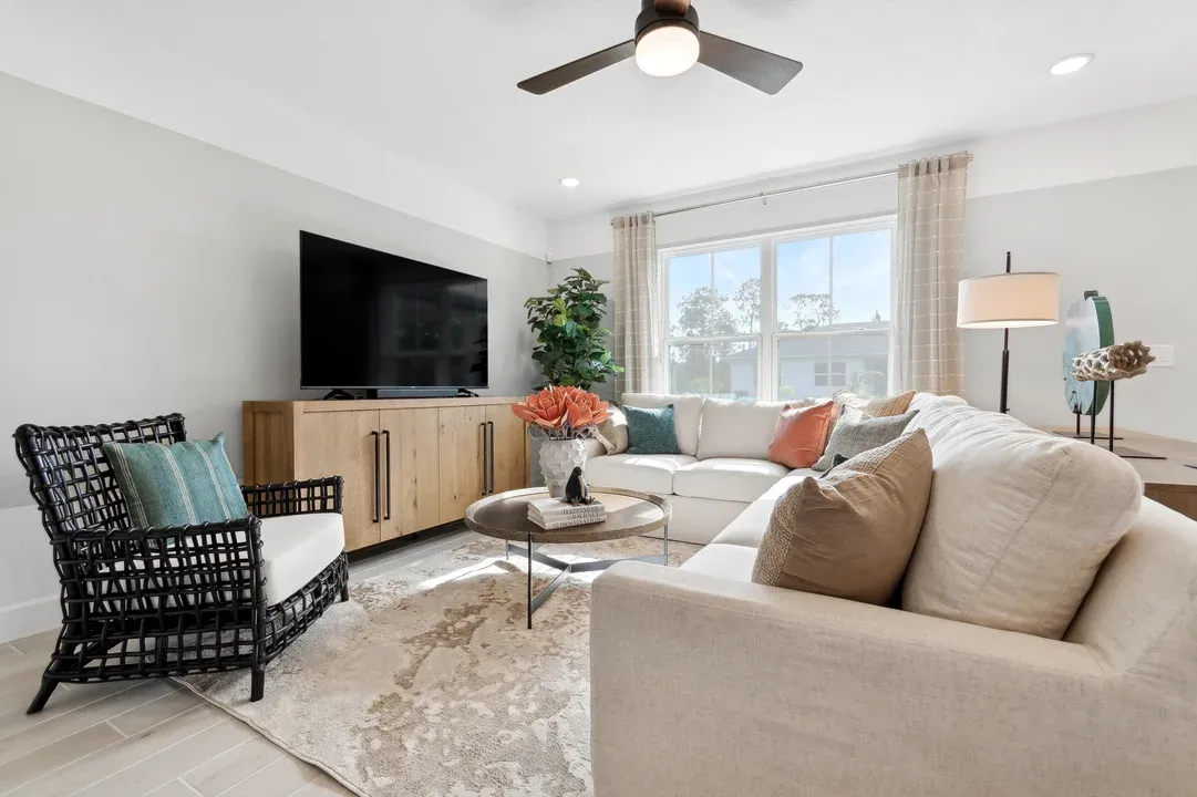 Great room with ceiling fan