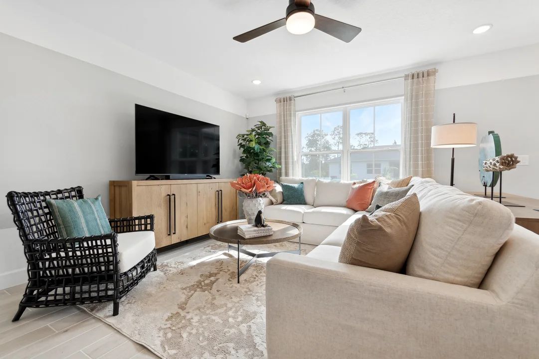 Great room with ceiling fan