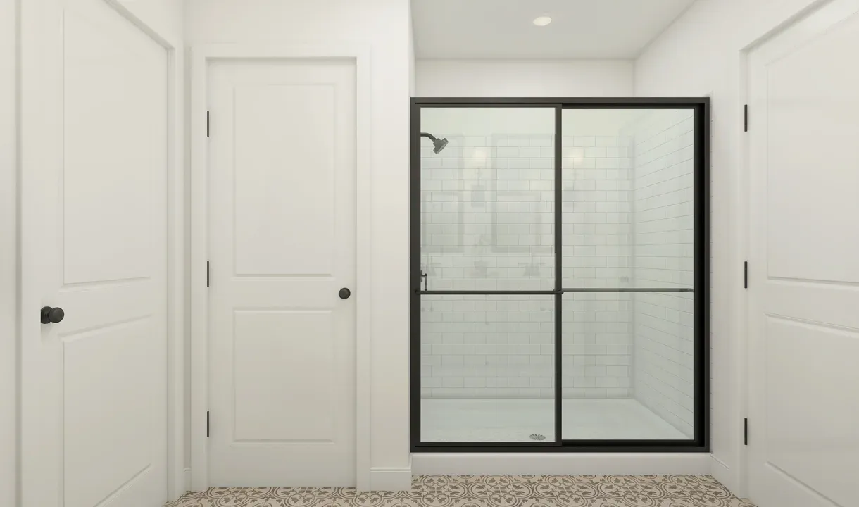 Primary bath with glass-shower enclosure