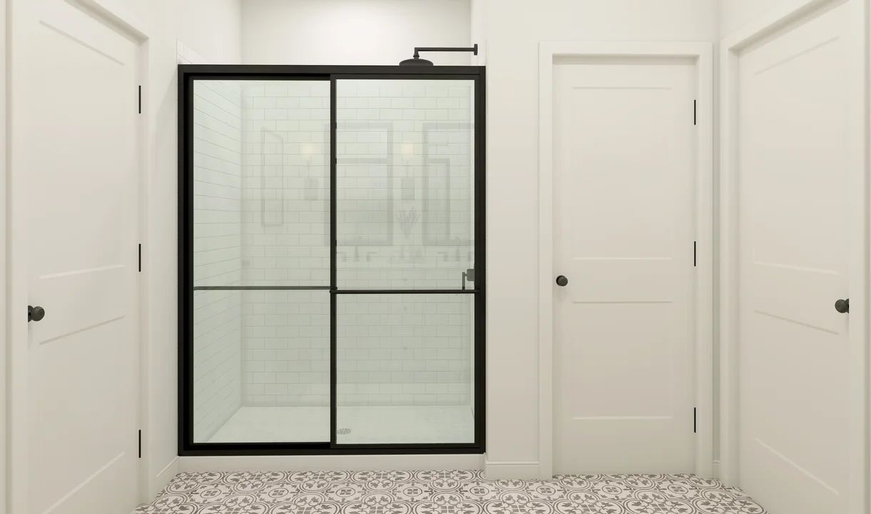 Primary bath with glass-shower enclosure