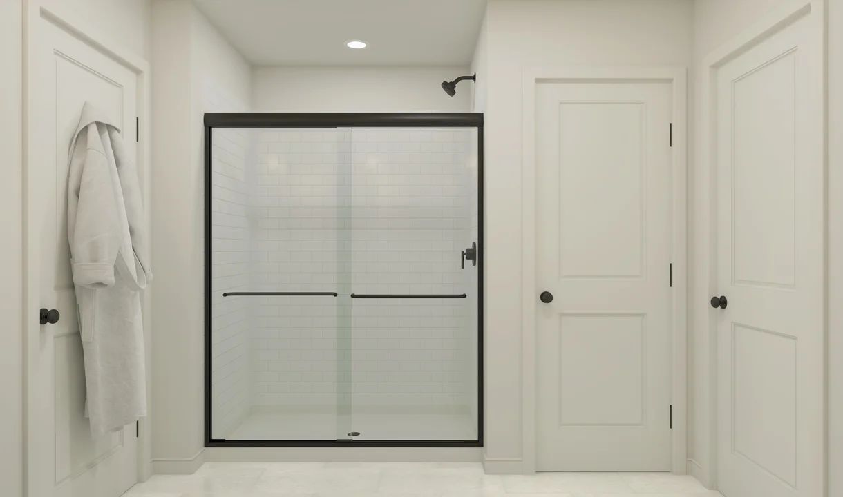 Primary bath with matte black shower enclosure