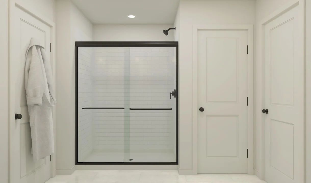 Primary bath with matte black shower enclosure