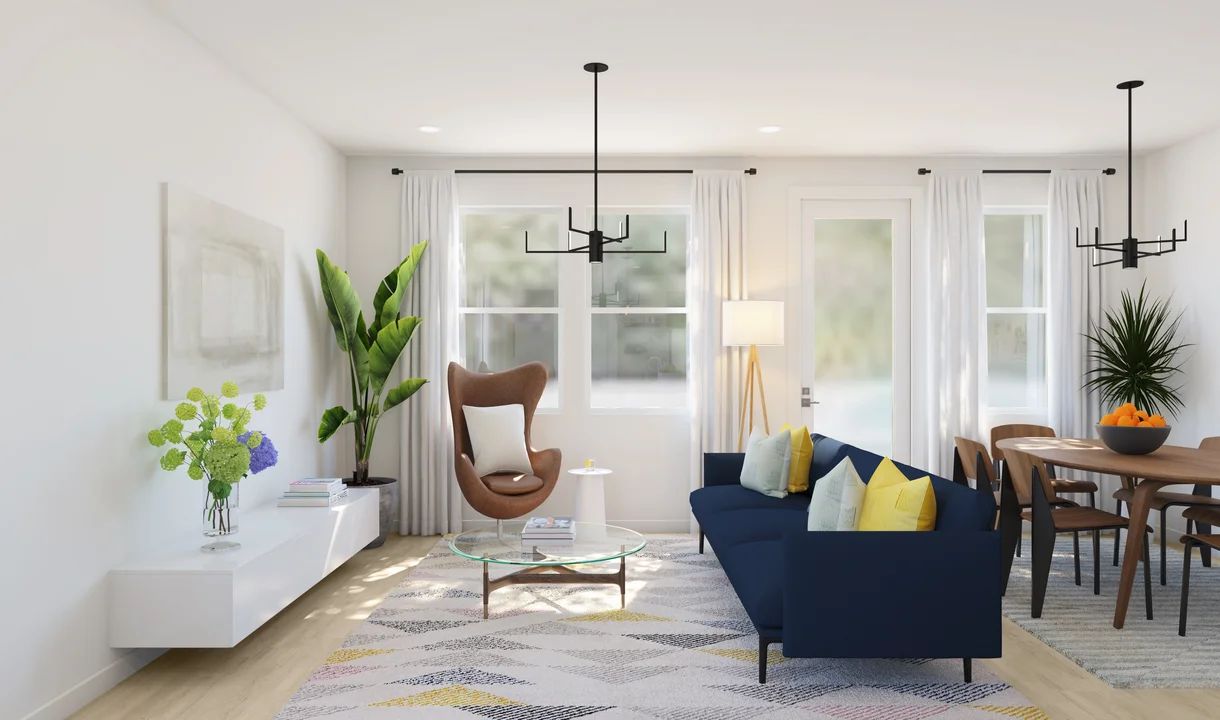 Great room with chandelier and luxurious wood flooring