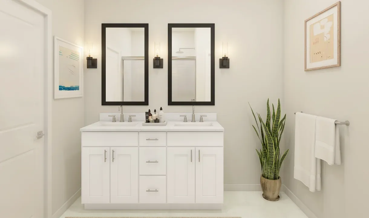 Primary bath with black-framed mirrors