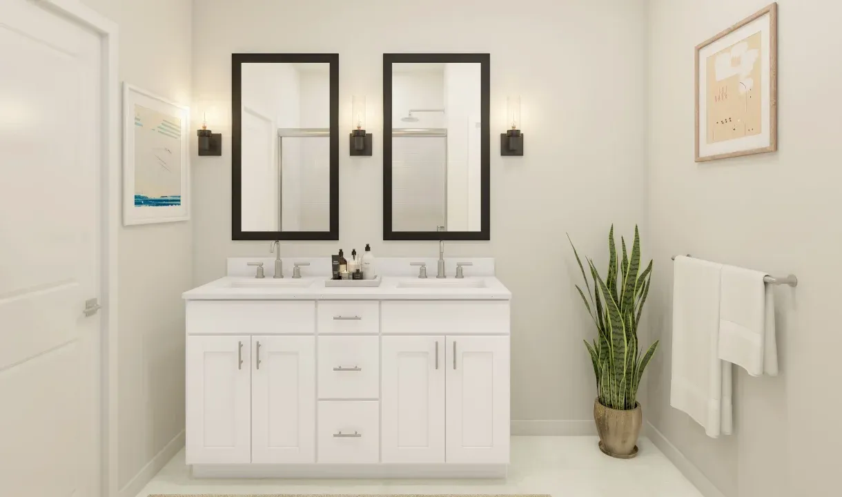 Primary bath with black-framed mirrors