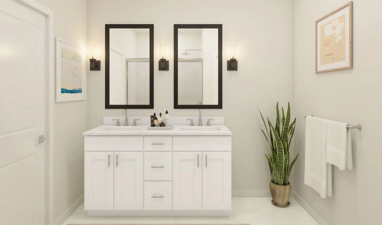 Primary bath with black-framed mirrors