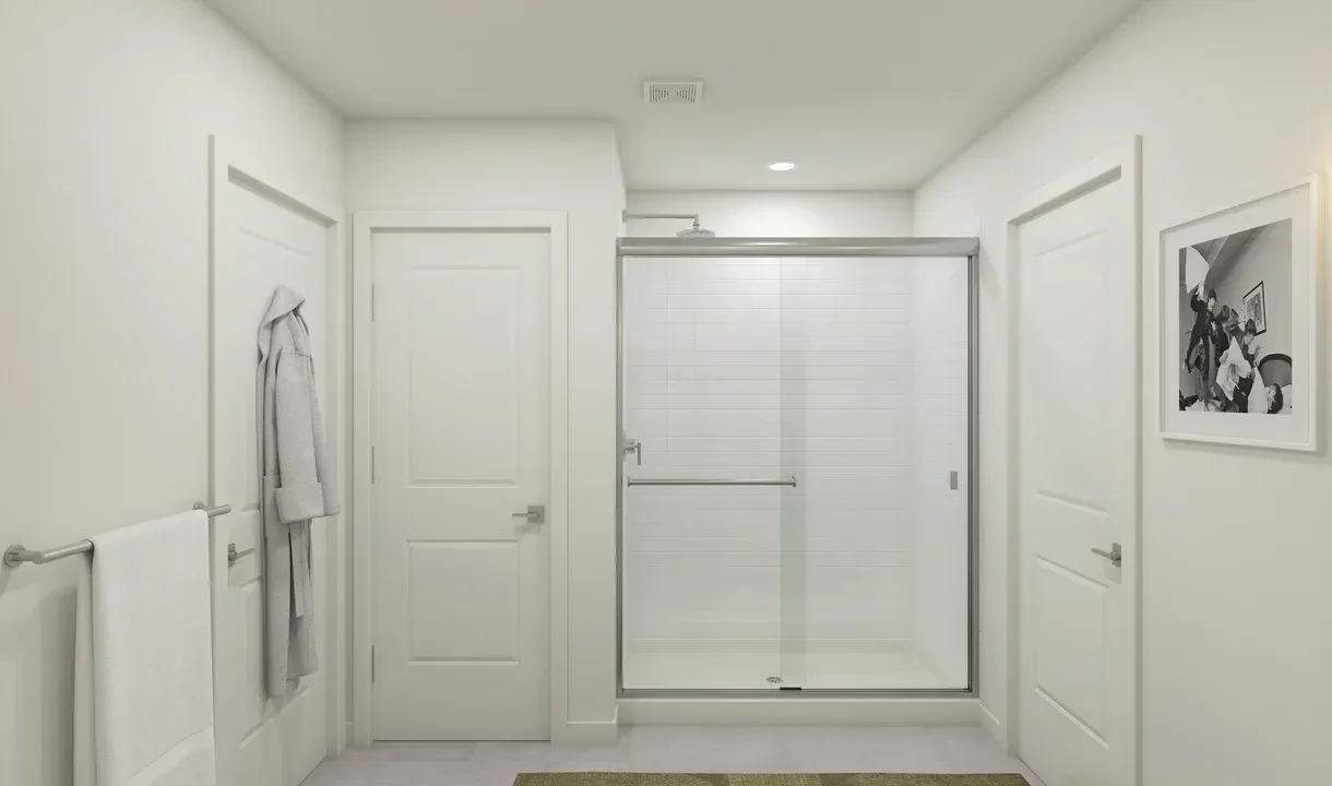 Primary bath with glass shower enclosure