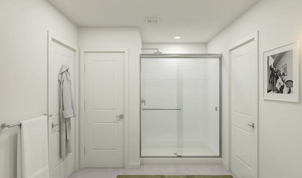 Primary bath with glass shower enclosure