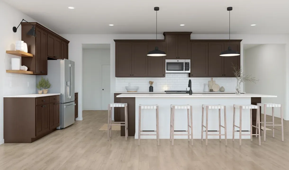 Kitchen with pendant lights & vast island