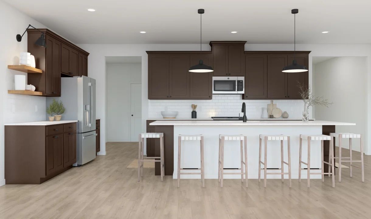 Kitchen with pendant lights & vast island