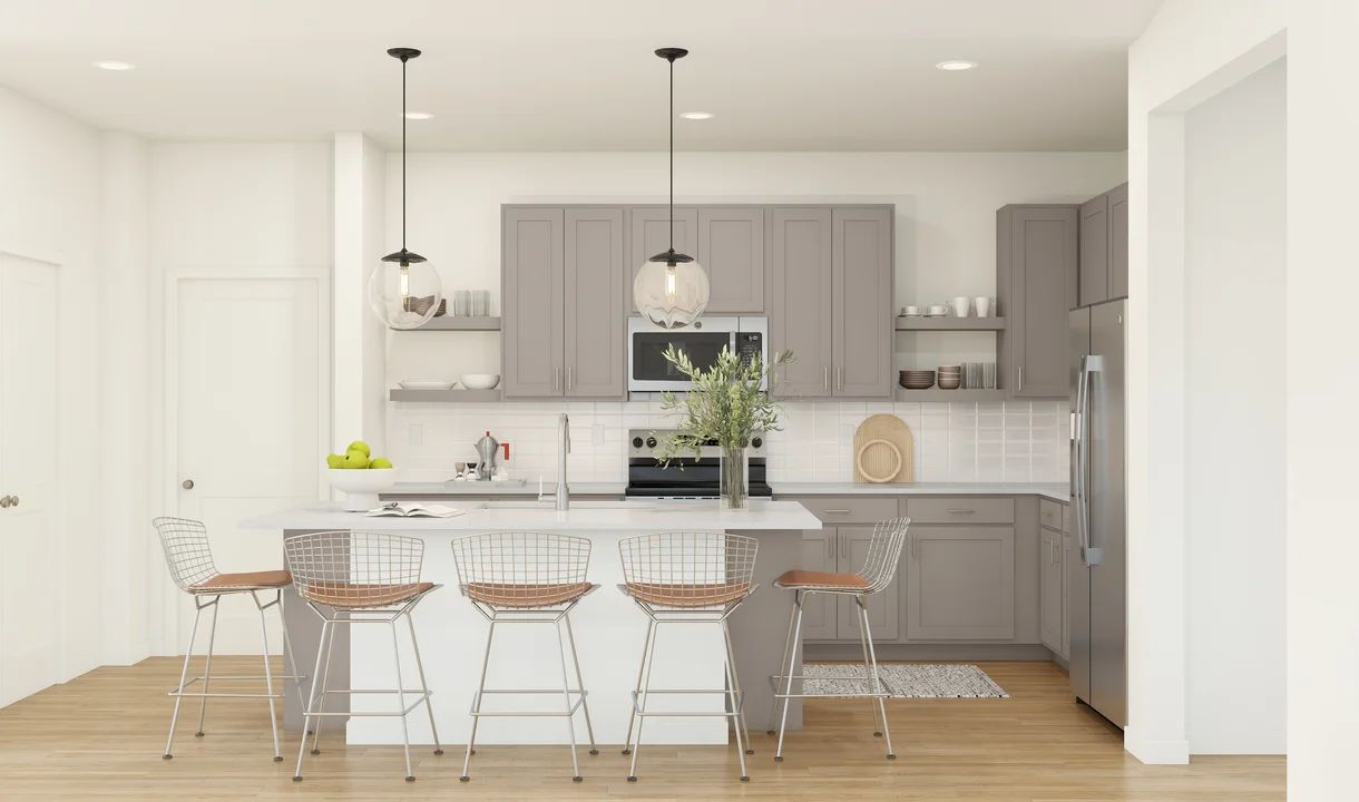 Kitchen with pendant lights & vast island
