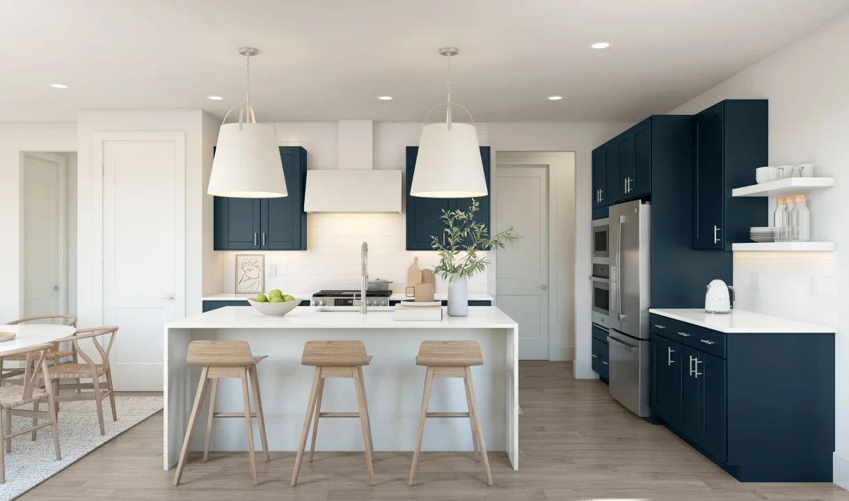 Kitchen with pendant lights & waterfall island