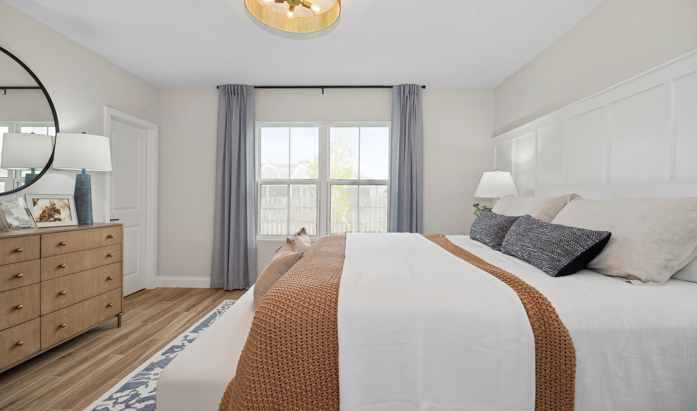 Primary suite with decorative feature wall