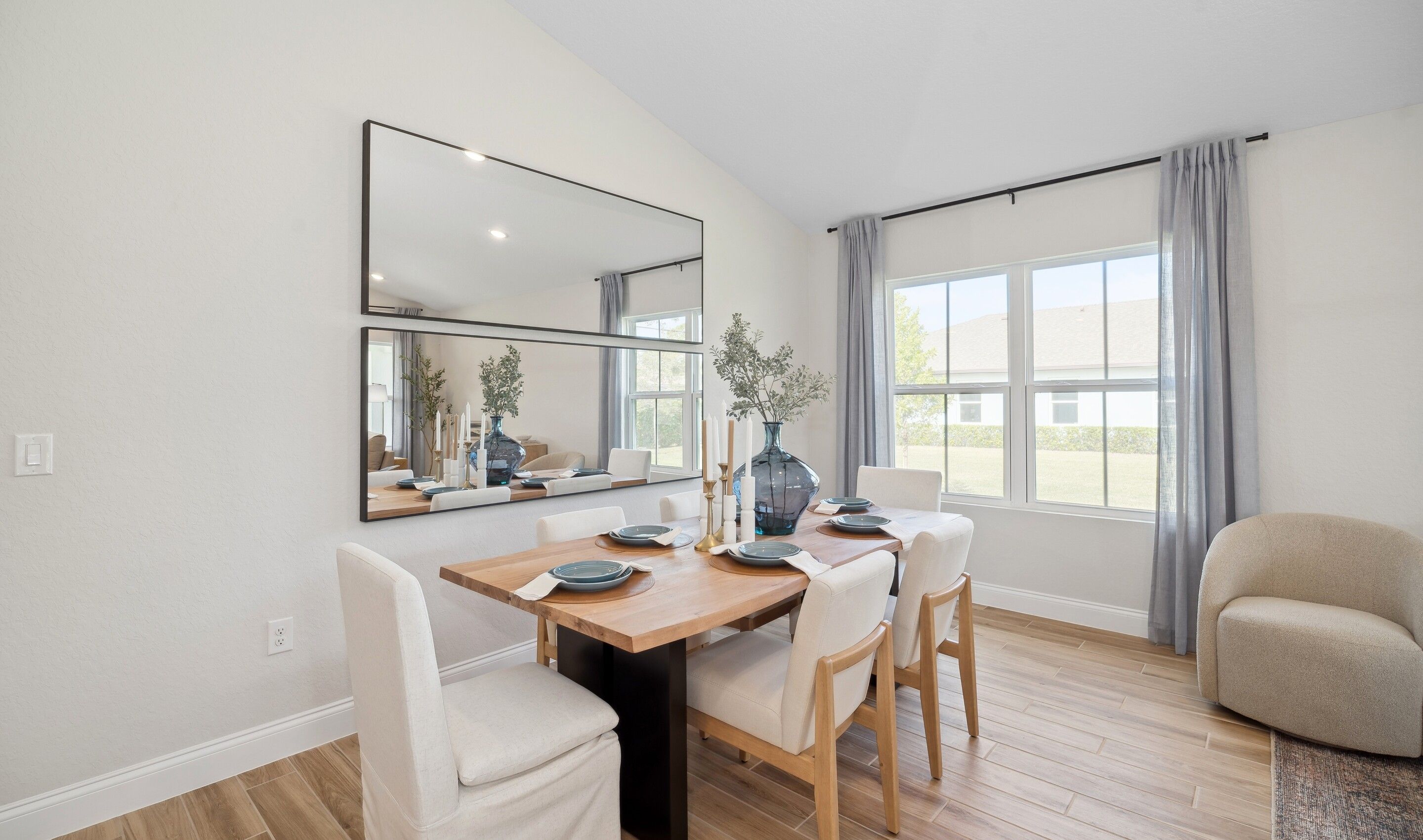 Dining area with vaulted ceiling