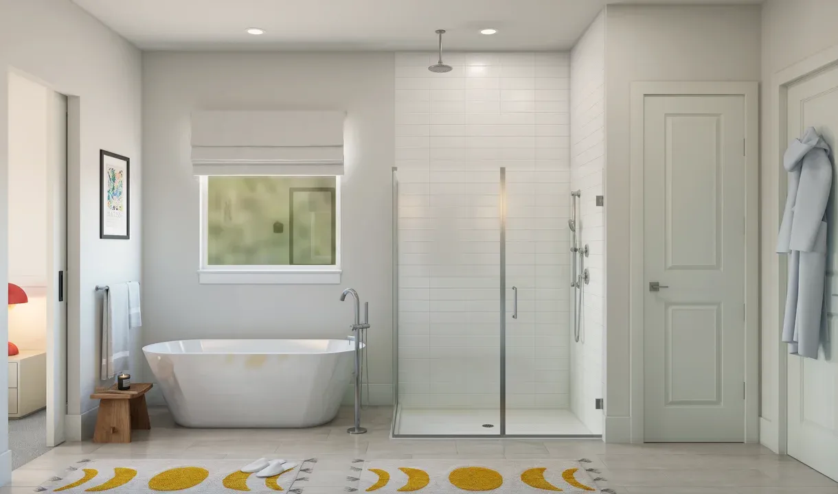 Primary bath with glass shower enclosure and freestanding tub