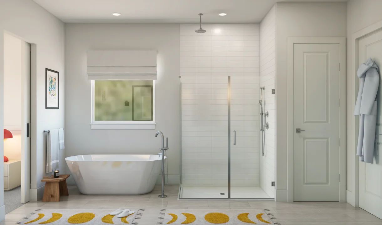 Primary bath with glass shower enclosure and freestanding tub