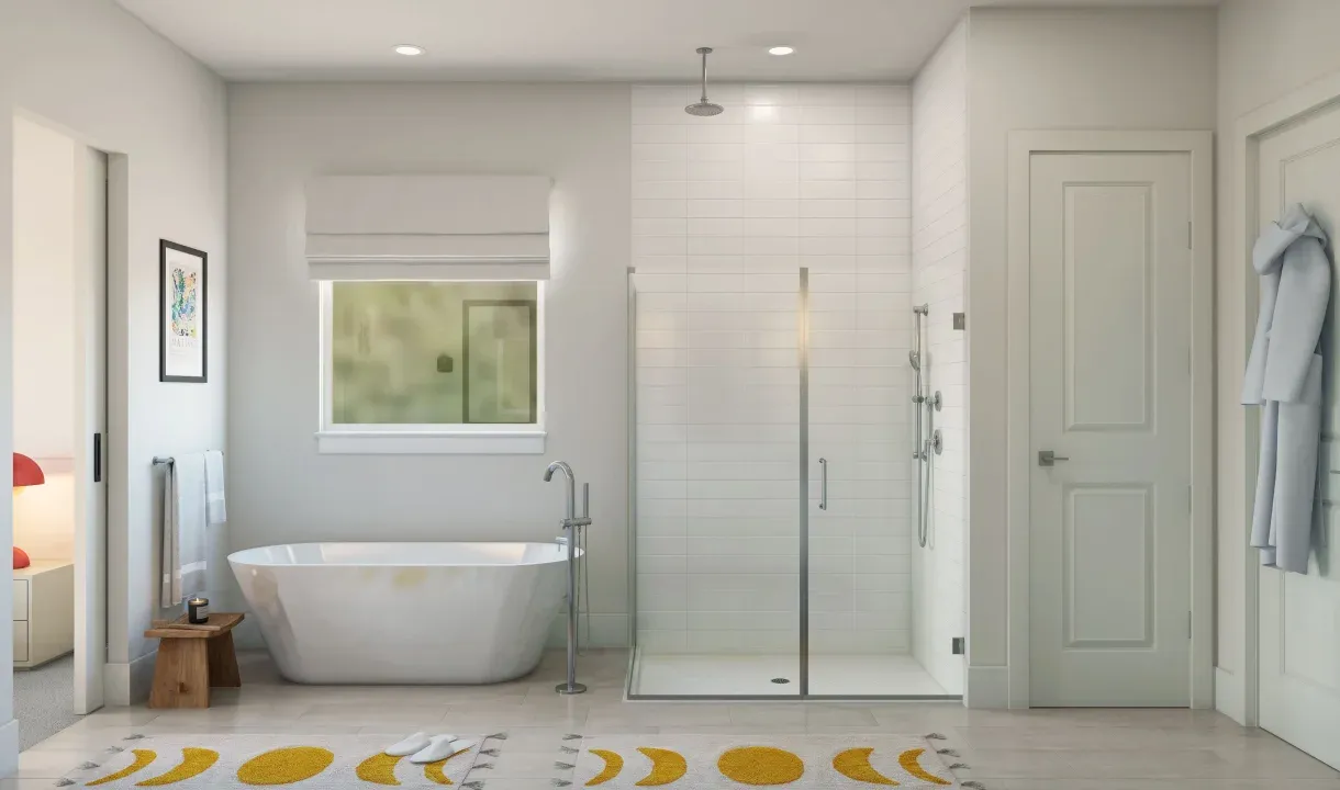 Primary bath with glass shower enclosure and freestanding tub