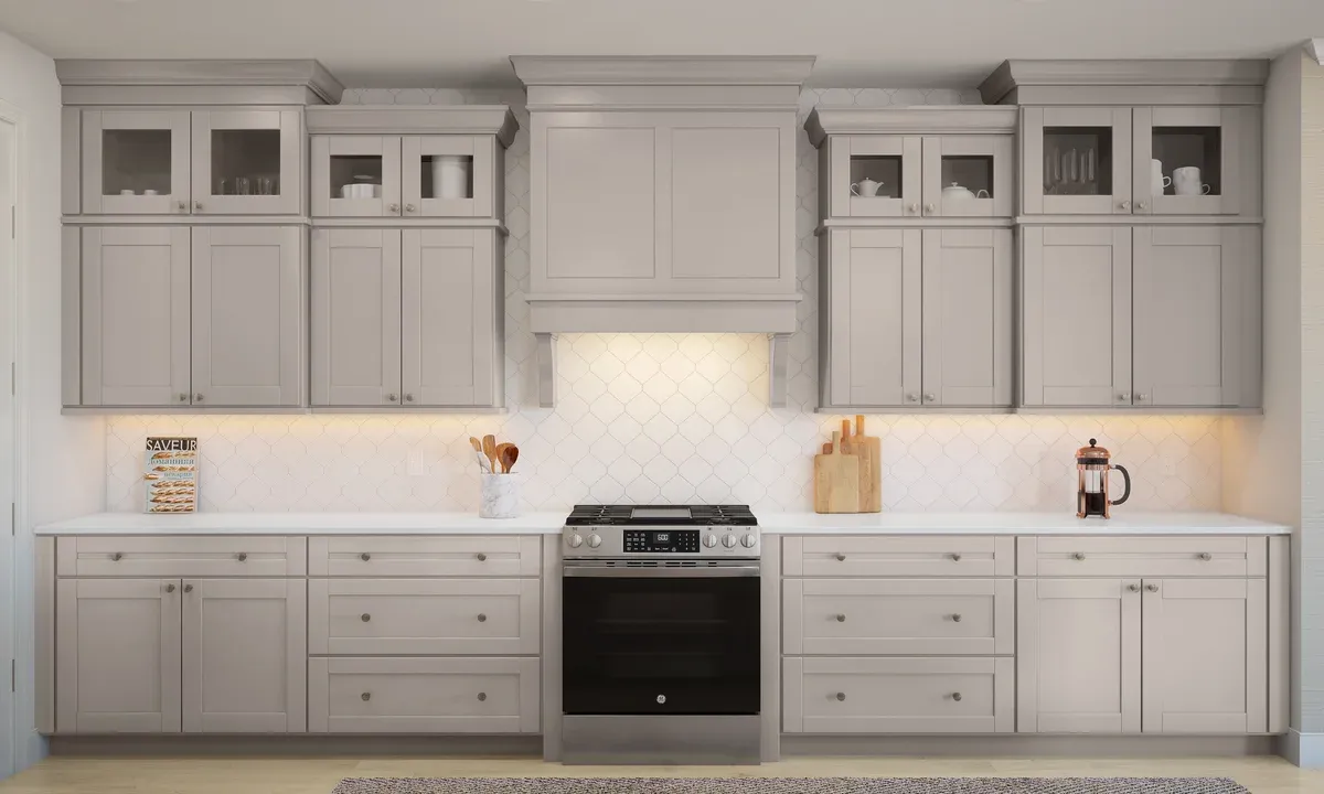 Kitchen with stainless steel appliances and glass upper cabinets