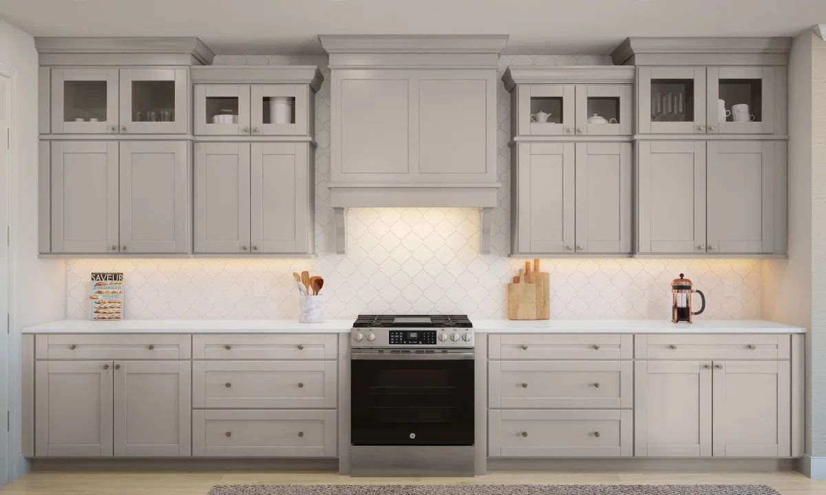 Kitchen with stainless steel appliances and glass upper cabinets