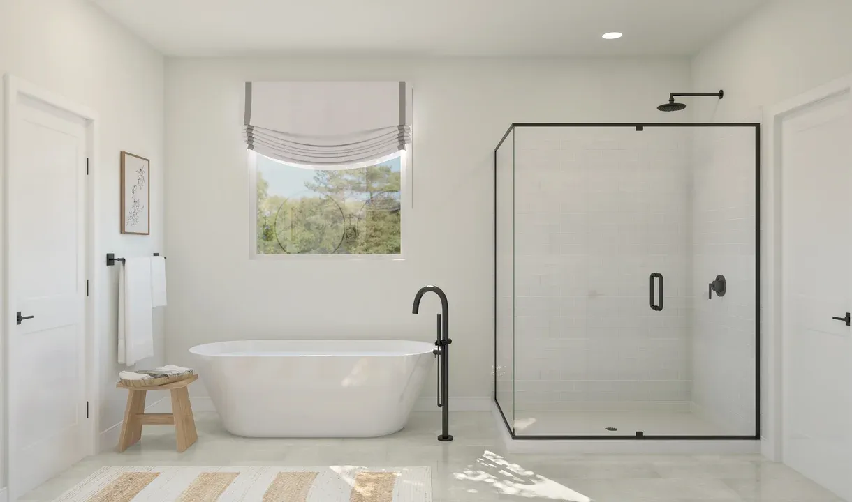 Primary with freestanding vanity and glass shower enclosure