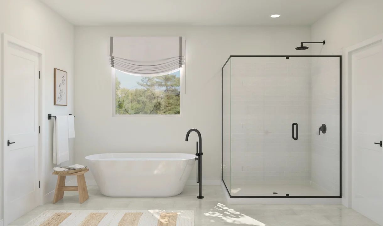 Primary with freestanding vanity and glass shower enclosure