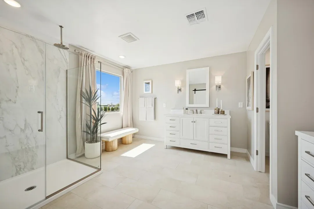 Primary bath with glass shower enclosure