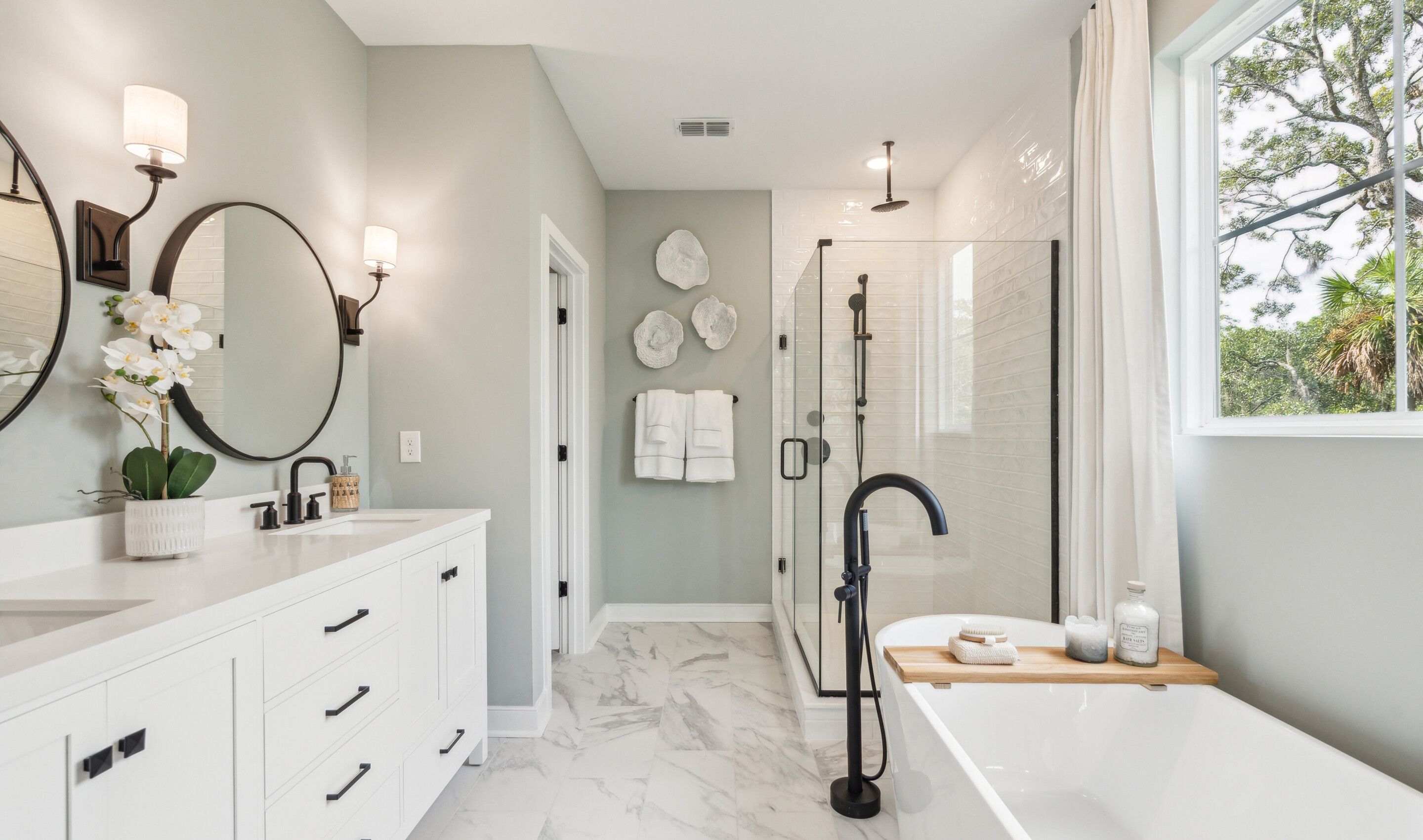 Primary bath with freestanding tub & glass shower