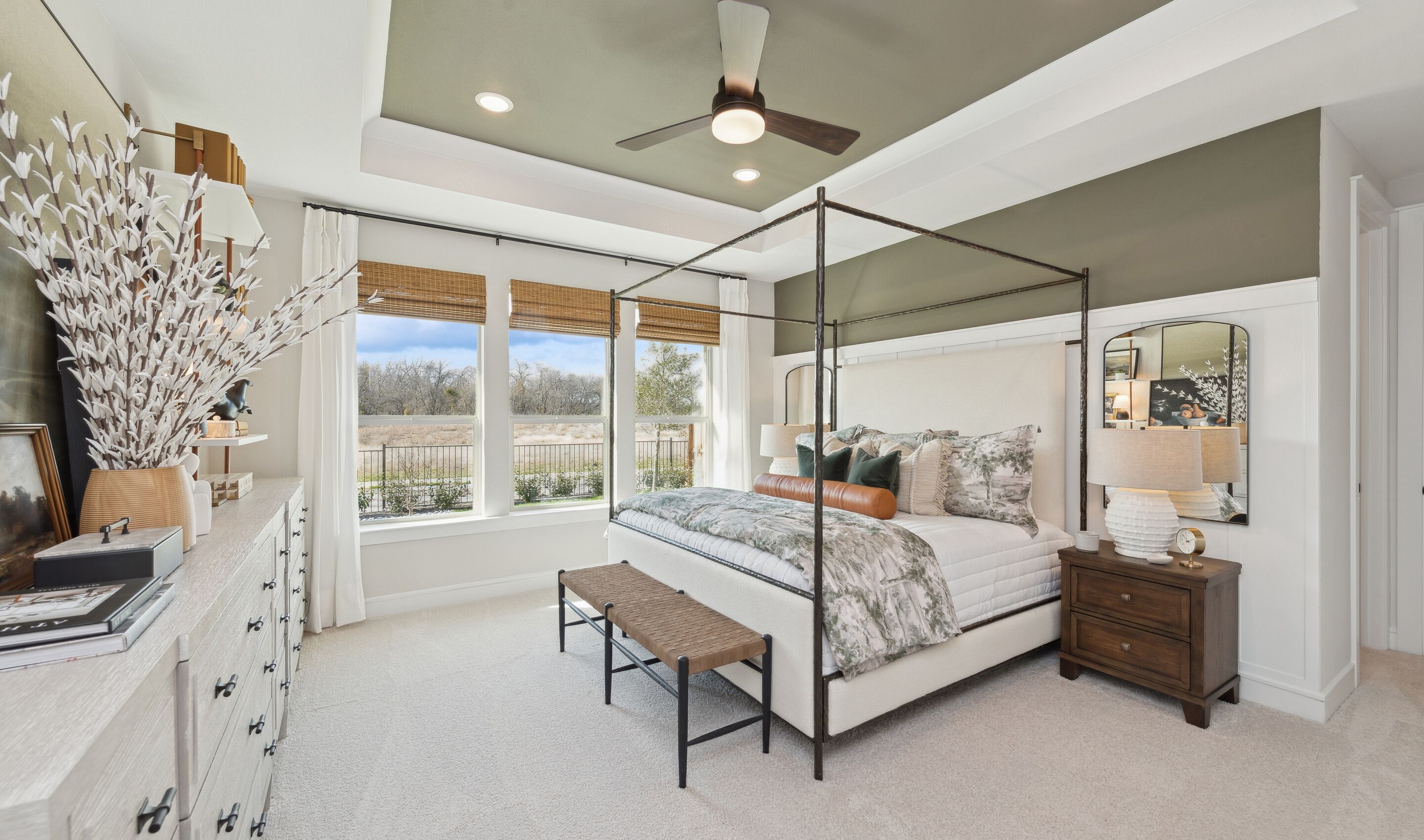 Primary suite with decorative feature wall