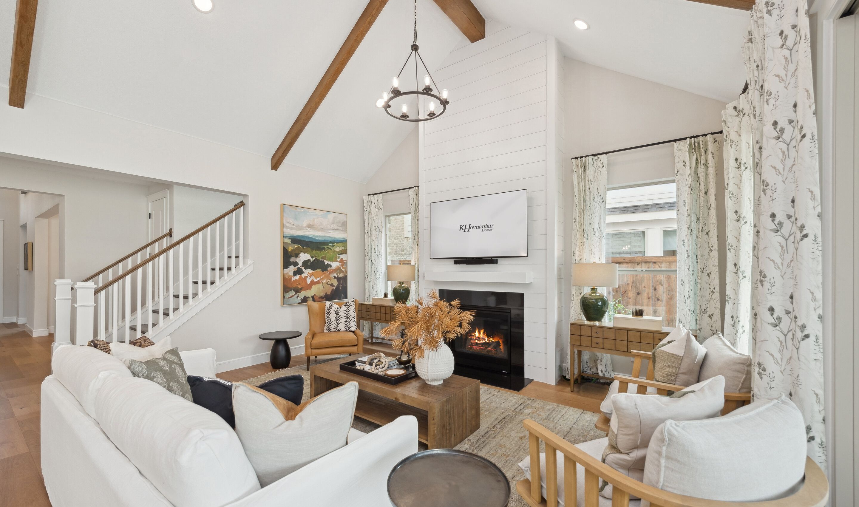 Great room with vaulted ceiling and fireplace