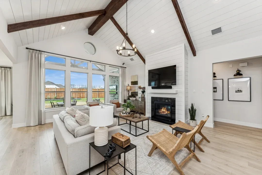 Great room with shiplap detail and fireplace