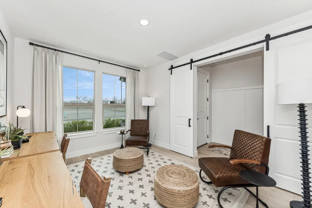Home office features sliding barn doors